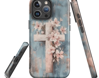 May include: A phone case with a white cross and pink flowers on a blue and white background.