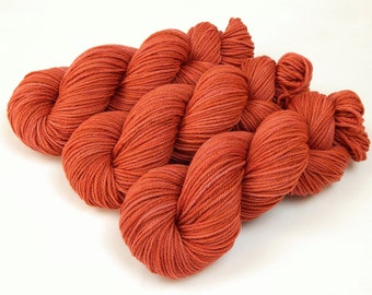 Hand Dyed Yarn. Worsted Weight 100% Superwash Merino Wool. CINNABAR. Indie Dyer Red-Orange Knitting Yarn. Soft Tomato Red Crochet Yarn