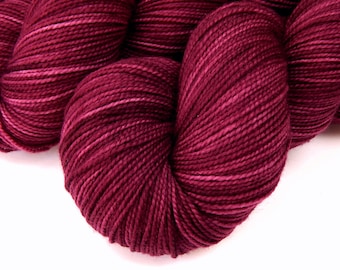 Hand Dyed Yarn. Sock Fingering Superwash Merino Wool. PLUMBERRY. Tonal Knitting Yarn. Indie Dyer Red Berry Semi-Solid Hand Dyed Sock Yarn