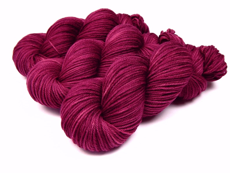 Hand Dyed Yarn. Worsted Weight 100% Superwash Merino Wool. PLUMBERRY. Indie Dyed Tonal Berry Red Knitting Yarn. Knitter Gift image 1