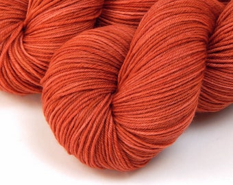 Hand Dyed Sock Yarn. Fingering Weight 4 Ply Superwash Merino Wool. CINNABAR. Indie Dyer Knitting Yarn. Tonal Tomato Red Hand Dyed Yarn