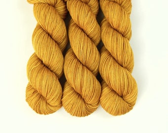 Hand Dyed Sock Yarn. Fingering Weight 4 Ply Superwash Merino Wool. HONEY MUSTARD. Indie Knitting Yarn. Tonal Gold Yellow Hand Dyed Yarn