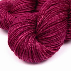 Hand Dyed Yarn. Worsted Weight 100% Superwash Merino Wool. PLUMBERRY. Indie Dyed Tonal Berry Red Knitting Yarn. Knitter Gift image 3