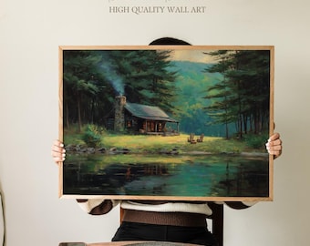 May include: A framed wall art print featuring a cabin scene with a lake and forest. The artwork has a wooden frame and depicts a cabin with smoke rising from the chimney. The text "Sundried Season" and "HIGH QUALITY WALL ART" is at the top.