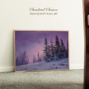 May include: A framed wall art print featuring a winter landscape with snow-covered evergreen trees under a purple and pink starry sky. The artwork is in a wooden frame and includes the text "Sundried Season HIGH QUALITY WALL ART".