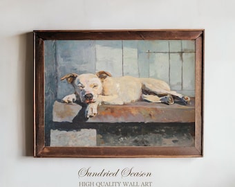 Puede incluir: Pintura enmarcada de un perro color crema durmiendo sobre una superficie de madera. El perro está acostado con los ojos cerrados, y la obra de arte tiene una estética vintage. El marco es de color marrón oscuro y el fondo es azul claro y blanco.