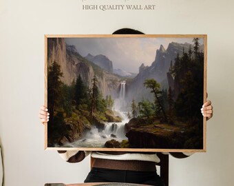May include: A framed landscape painting featuring a waterfall cascading down a rocky cliff, surrounded by lush green trees and mountains. The artwork is in a wooden frame, with the text "Sundried Season HIGH QUALITY WALL ART" at the top.