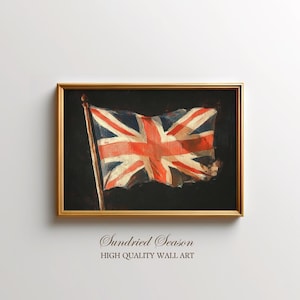Puede incluir: Pintura enmarcada de la bandera de la Union Jack, con colores rojo, blanco y azul. La bandera ondea en un mástil de madera sobre un fondo oscuro. El marco es dorado, y el texto "Sundried Season HIGH QUALITY WALL ART" está en la parte inferior.