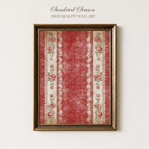 May include: Framed wall art with a vintage aesthetic. The artwork features a red background with vertical cream-colored stripes adorned with floral and lace patterns. The frame is a warm brown color. The text "Sundried Season" and "HIGH QUALITY WALL ART" are at the top.