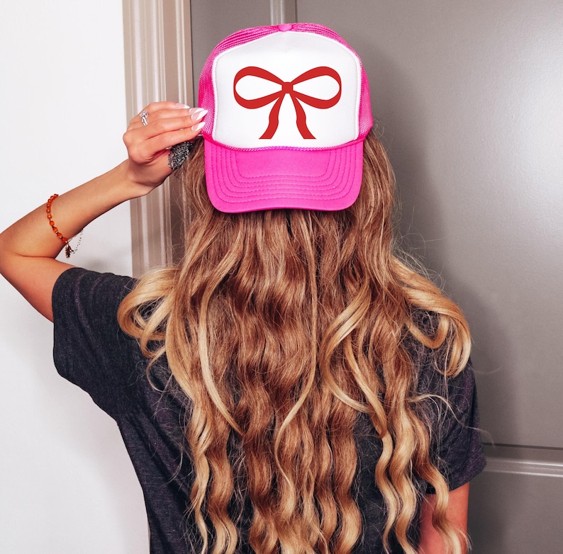 pink trucker hat with red bow