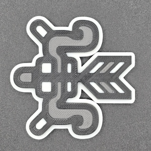 May include: A white and gray 3D printed design of a stylized arrow with a geometric pattern. The arrow is pointing to the right.