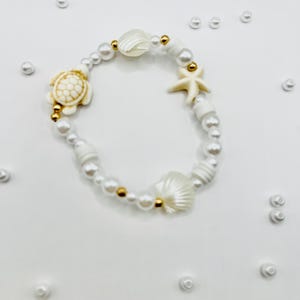 Coastal Shell, Turtle, and Starfish Pearl Bracelet