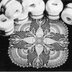 May include: A white crocheted doily with a delicate floral design. The doily is surrounded by balls of white yarn.