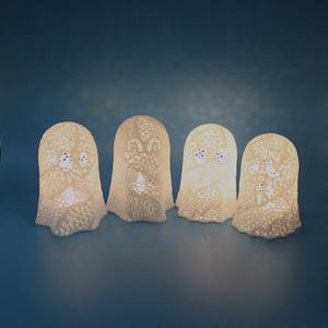 Spooky Light-Up Halloween Ghost Décor – Flickering LED Tealight Included! Choose from 4 Haunted Faces for a Ghastly Glow!
