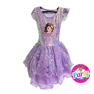 May include: Purple tulle dress with a sequined bodice featuring a princess character. The dress has a layered tulle skirt with silver stars and swirls.