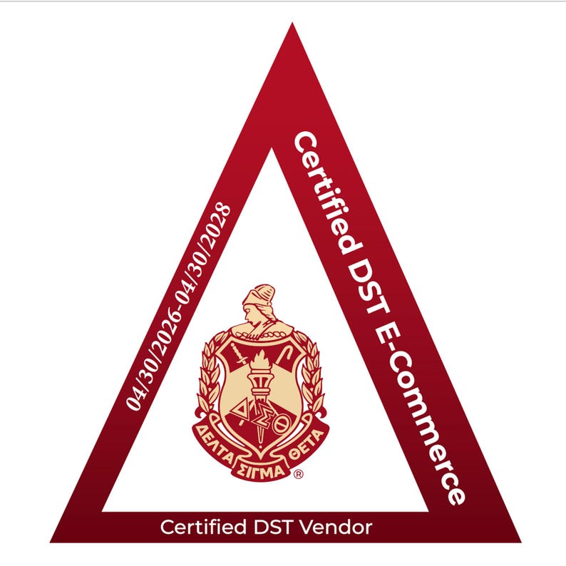 May include: A triangular maroon emblem featuring the text Certified DST E-Commerce and Certified DST Vendor. The center displays a crest with a torch, a sword, and Greek letters. The left side includes the date range 04/30/2026-04/30/2028.
