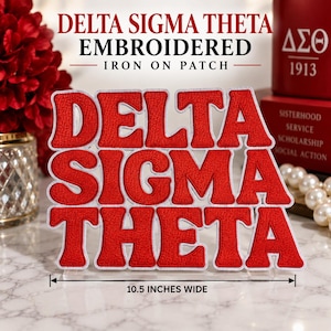 May include: A red embroidered iron-on patch featuring the text DELTA SIGMA THETA in bold, block letters with a white border. A black line with arrows indicates a width of 10.5 inches. The text DELTA SIGMA THETA EMBROIDERED IRON ON PATCH is visible.