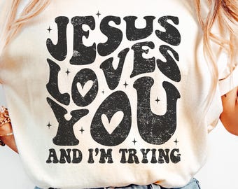 Jesus Loves You and I'm Trying T-Shirt: Faith Based Christian Tee, Funny Christian Merch, Christian Apparel, Bible Verse, Faith Shirt