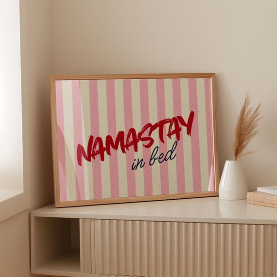 Namastay in Bed Poster – Retro Typography Wall Art with Pink Stripes, Yoga Print