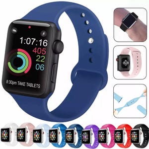 May include: A set of 12 silicone watch bands for Apple Watch in various colours, including pink, blue, purple, red, and black. The bands are shown on a white background. 8:30pm TAKE TABLETS is displayed on the watch face.