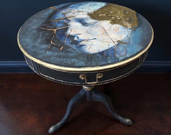Hand painted round end table. Dramatic accent table.
