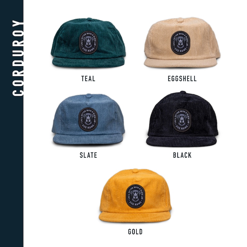 May include: Five corduroy baseball caps in different colors: teal, eggshell, slate, black, and gold. Each cap features a black and white embroidered patch with a dog's head and the text "Life's Better With A Rescue Dog" and "Dog Name".