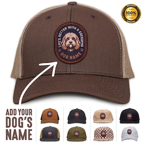 May include: Brown and tan trucker hat with a patch that says "Life's Better With A Cockapoo" and has a cartoon image of a Cockapoo dog. The text "Dog Name" is below the image.