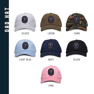 May include: Dad hat in various colors, including silver, loden, camo, light blue, navy, black, and pink. The hat features a patch with a dog and the text "Life with my dog name".
