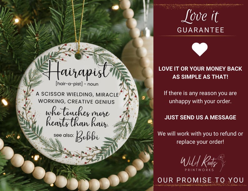 May include: A round, white ceramic ornament with the word "Hairapist" in black script. The ornament has a botanical wreath design and text that reads "A scissor wielding, miracle working, creative genius who touches more hearts than hair."
