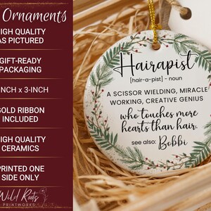 May include: A white ceramic ornament, 3-inch by 3-inch, with the word "Hairapist" and a definition printed on it. The ornament has a gold ribbon for hanging and is decorated with a green and red floral design. The text reads "who touches more hearts than hair."