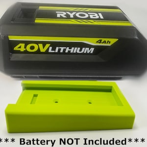 May include: Black and yellow Ryobi 40V Lithium battery with a 4Ah capacity. A bright green battery holder is below. The text "Battery NOT Included" is at the bottom.