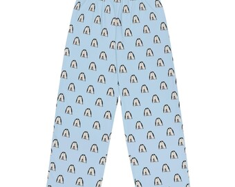 May include: Light blue pajama pants featuring an all-over repeating pattern of small, stylized black and white penguins. The pants have a straight-leg cut, a gathered elastic waistband, and a consistent print of the birds facing forward.