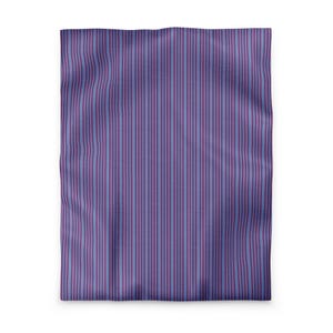 May include: A rectangular fabric blanket featuring a repeating vertical striped pattern in alternating shades of deep purple and light periwinkle blue. The textile has a soft, slightly folded appearance with consistent vertical lines throughout the surface.