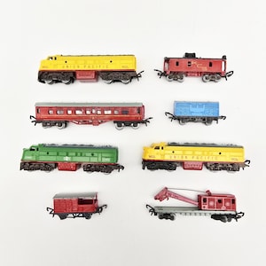 Lone Star England 9 Gague Train Set, Union Pacific & British Rail Locomotives, Cabooses, Cattle Car, Passenger Car, Crane and Tracks | 1960s
