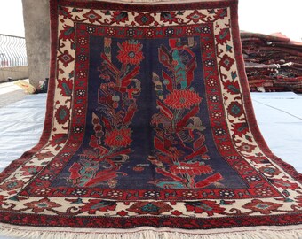 Tapis oriental vintage en pure laine rouge à motif géométrique Baluch