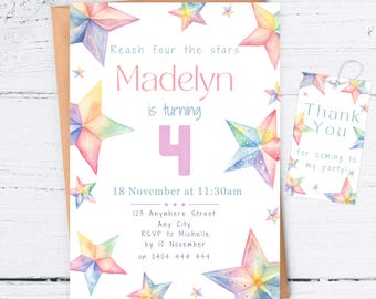 May include: A white birthday invitation featuring a pink and blue watercolour star design. The invitation reads "Reach for the stars Madelyn is turning 4" and includes the date and time of the party, the address, and RSVP details. A matching thank you tag is also included.