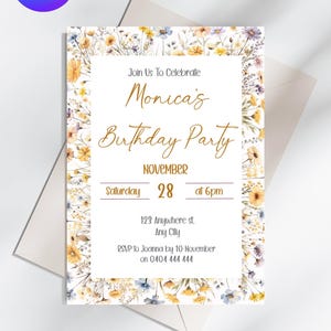 May include: A floral birthday party invitation with a white background and a gold border. The text reads "Join Us To Celebrate Monica's Birthday Party November 28 at 6pm 123 Anywhere st. Any City RSVP to Joanna by 10 November on 0404 444 444".