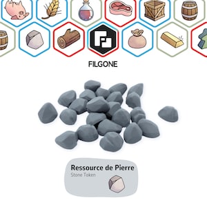 Könnte beinhalten: Ein Haufen grauer Stein-Spielsteine, die in Brettspielen verwendet werden. Die Spielsteine sind aus einem glatten, abgerundeten Material gefertigt. Der Text "Ressource de Pierre" und "Stone Token" ist unterhalb des Steinhaufens sichtbar.