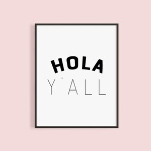 May include: Black and white printable wall art with the text "Hola Y'all" in a bold, modern font.