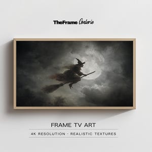 Peut inclure: Une œuvre d'art encadrée représente une sorcière sur un balai devant une pleine lune. L'œuvre est dans un style sombre et atmosphérique, mettant en valeur la silhouette de la sorcière et la lueur de la lune. Le cadre est en bois clair. Le texte "TheFrame Galerie" est en haut.