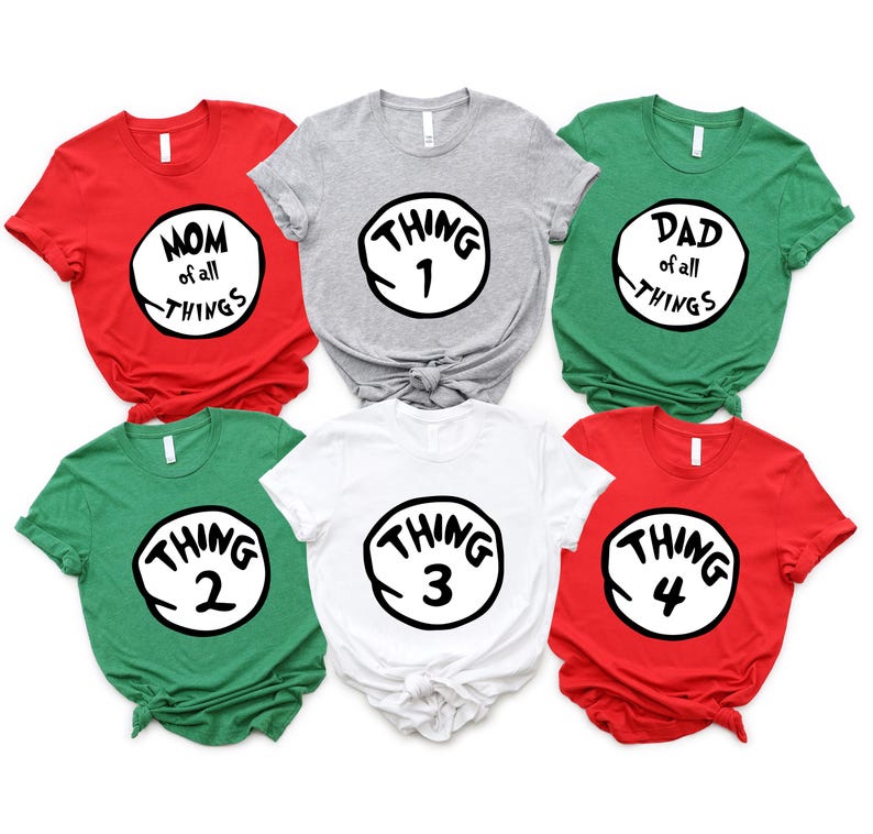 May include: Six short-sleeved t-shirts in red, gray, green, and white. Each shirt features a black and white circular design with the words "MOM of all THINGS", "THING 1", "DAD of all THINGS", "THING 2", "THING 3", and "THING 4".