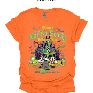 May include: Orange t-shirt featuring a graphic for Mickey's Not-So-Scary Halloween Party at Walt Disney World. The design includes Mickey Mouse, Minnie Mouse, Donald Duck, Goofy, Pluto, and a spooky castle.