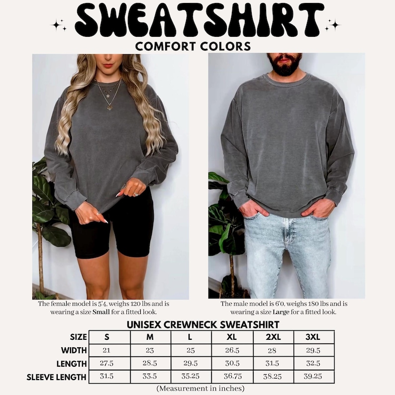 May include: Dark grey unisex crewneck sweatshirt. The image shows a woman wearing a size small and a man wearing a size large. The sweatshirt measurements are provided in inches: width from 21 to 29.5 inches, length from 27.5 to 32.5 inches, and sleeve length from 31.5 to 39.25 inches.