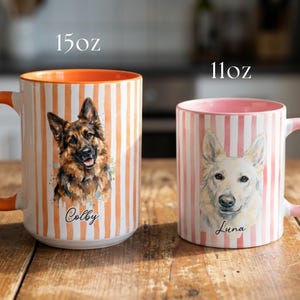 May include: A white ceramic mug with a black handle and the text "But First, Coffee" in a bold, black font. The mug is set against a blurred background, suggesting a cozy setting.