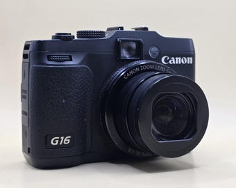 Fotocamera digitale Canon PowerShot G16 da 12 MP con zoom 5x + batteria testata, leggere la descrizione.
