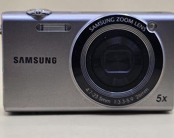 Appareil photo numérique Samsung SH100 Wi-Fi 14,2 MP, zoom 5x, argent, testé et fonctionnel.