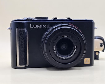 Fotocamera digitale Panasonic LUMIX DMC-LX3 da 10,1 MP con zoom ottico 2,5x, colore nero e autofocus.