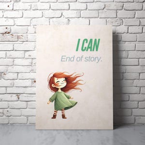 May include: A framed print with the words "I CAN, End of story." in green and gray. The print features a cartoon illustration of a girl with red hair and a green dress. The girl is smiling with her arms out.
