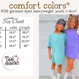 May include: Two young people wearing oversized t-shirts, one light blue and one purple. The image includes a size chart with measurements in inches for youth t-shirts. The brand name "comfort colors" is visible.