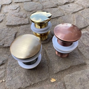 Unlacquered solid brass sink drain, solid brass drain, pop-up drain